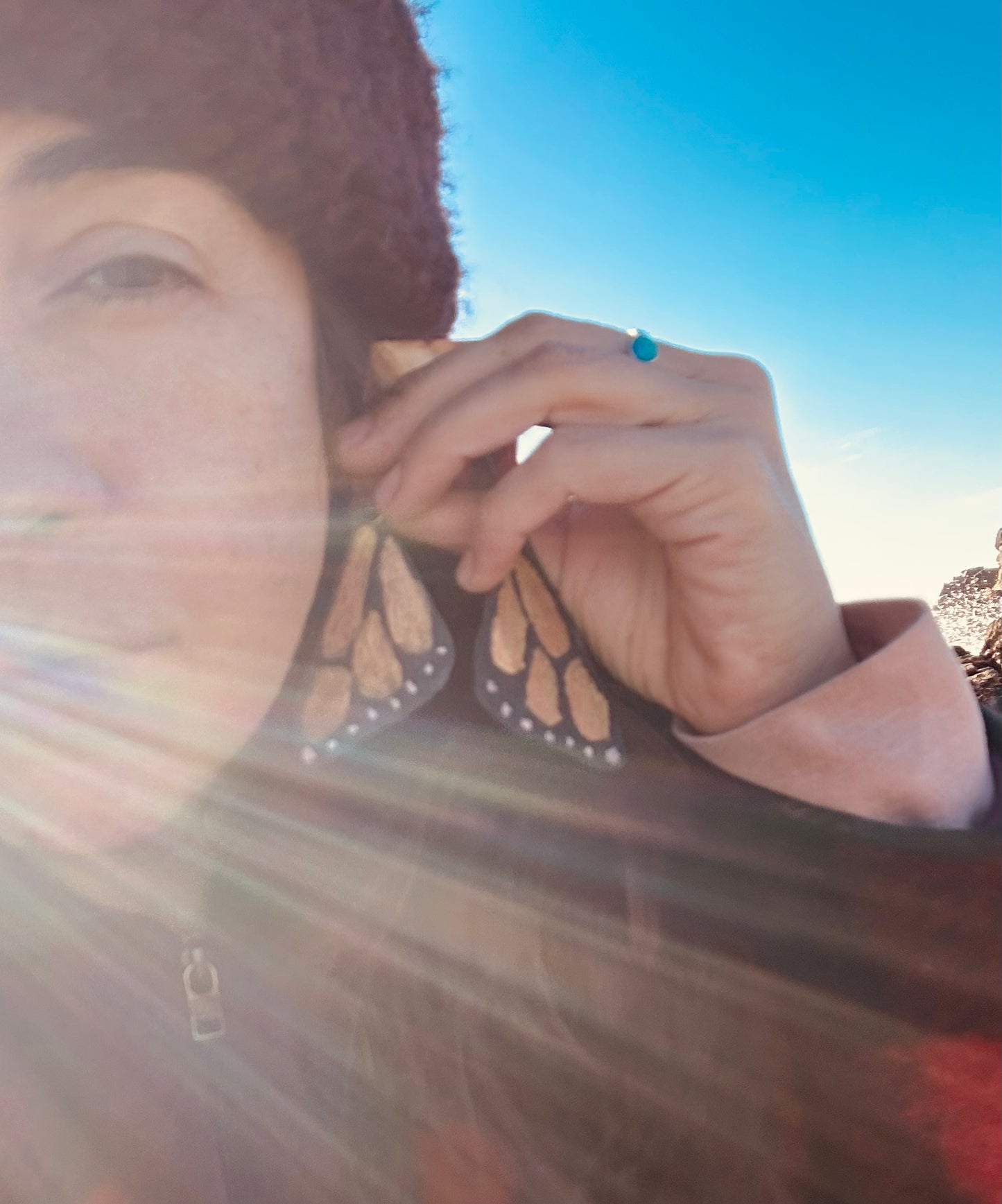 be the change earrings